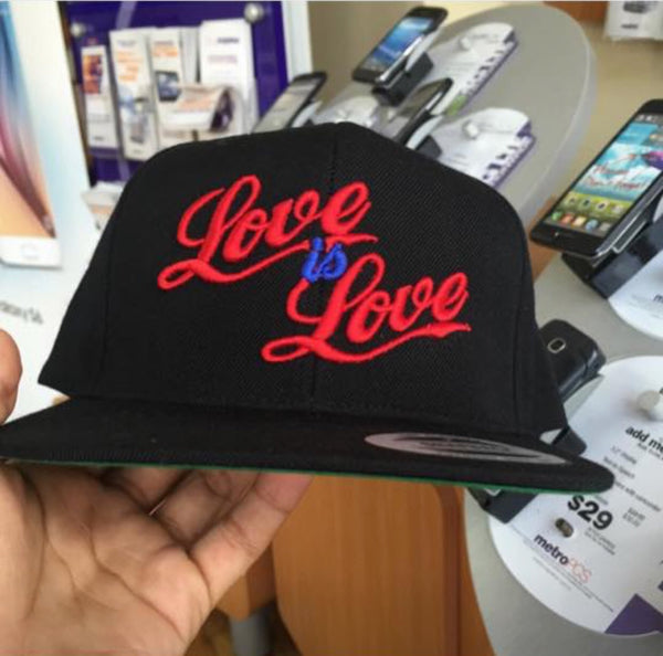 Black “LOVE IS LOVE SNAPBACK” (Online Exclusive)